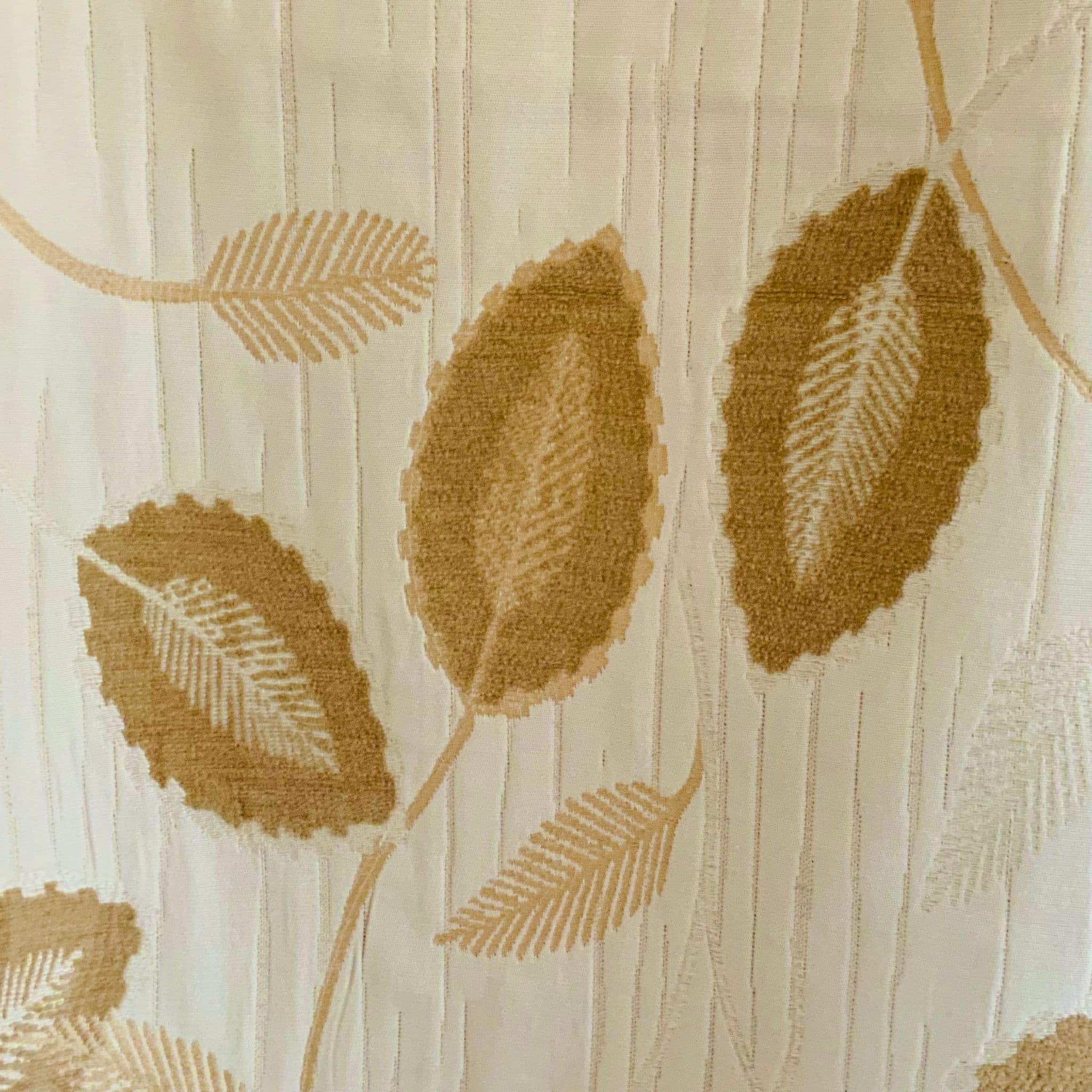 Quilted Chenille Cream Fabric in Trailing Leaves Design.   1.1 mts